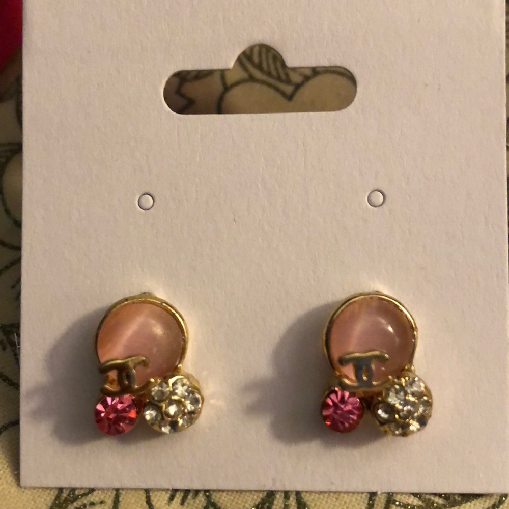 Gold and pink earrings.
